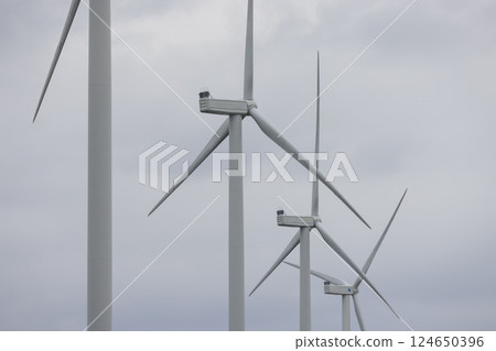 wind turbines in the field wind turbines in the field 124650396