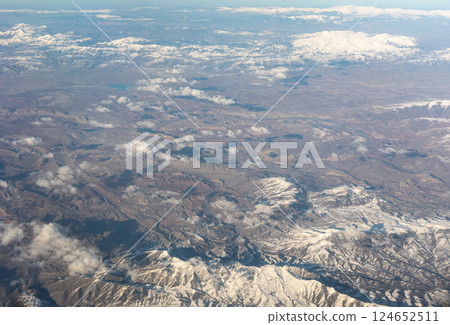 Plane Window View, Snow Mountains Aircraft Fly Landscape, Looking from Plane Cabin 124652511