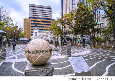 Yokohama cityscape in Japan: View of Yokohama Kaigan Church and the site of the signing of the Treaty of Peace and Amity between the United States and Japan from the Port Opening Square Yokohama cityscape in Japan: View of Yokohama Kaigan Church and the site of the signing of the Treaty of Peace and Amity between the United States and Japan from the Port Opening Square 124653195