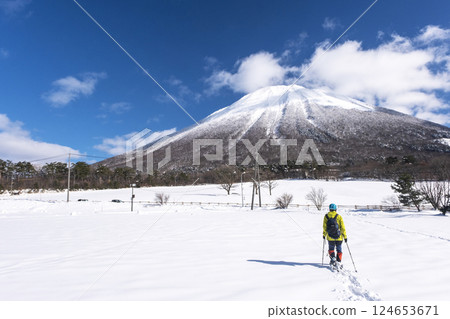 Snowshoe trekking image with Mt. Oyama in the background Snowshoe trekking image with Mt. Oyama in the background 124653671