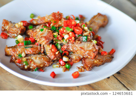 stir fried pork or deep fried pork , fried pork or crispy pork stir fried pork or deep fried pork , fried pork or crispy pork 124653681