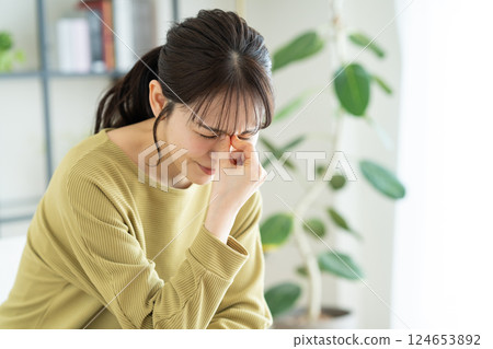 A tired young lady A tired young lady 124653892