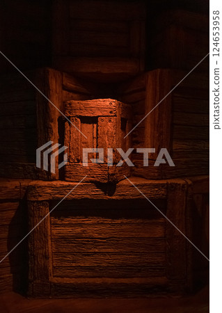 Weathered boxes in shadowy underground storage 124653958