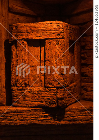 Handmade rustic crate illuminated by warm glow 124653959