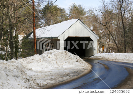 The Williamsville Covered Bridge in Vermont Along a Snowy Road in Winter Landscape The Williamsville Covered Bridge in Vermont Along a Snowy Road in Winter Landscape 124655692