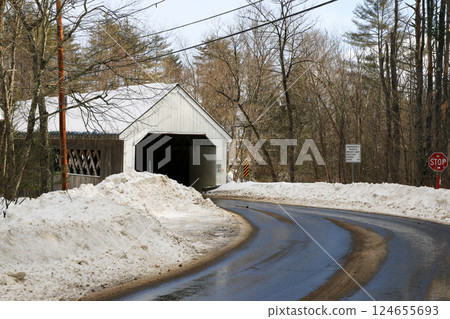 The Williamsville Covered Bridge Nestled in Snowy Landscape on a Winding Road The Williamsville Covered Bridge Nestled in Snowy Landscape on a Winding Road 124655693