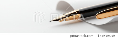 Elegant Black and Gold Pen on White Office Desk with Copy Space 124656056