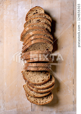 Sliced Artisan Sourdough Bread On Wood 124656303