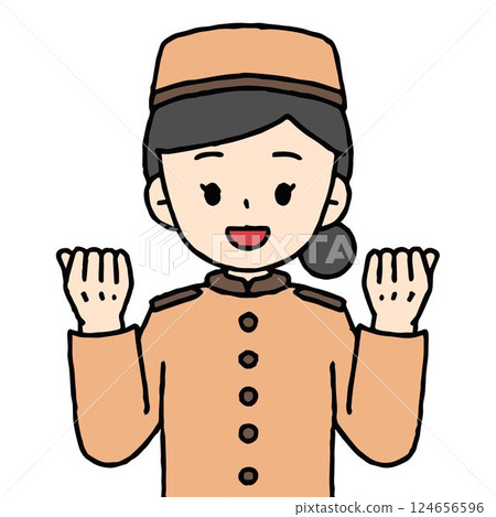 A female hotel attendant is doing a fist pump 124656596