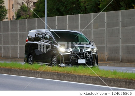Luxury minivan in motion Luxury minivan in motion 124656866