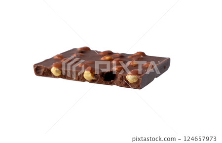 Dark chocolate with hazelnuts on white background. 124657973
