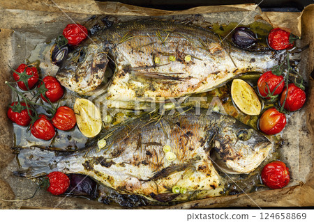 Baked dorado fish, seafood. 124658869