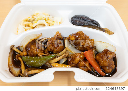 Delicious Chinese food, sweet and sour pork with black vinegar Delicious Chinese food, sweet and sour pork with black vinegar 124658897
