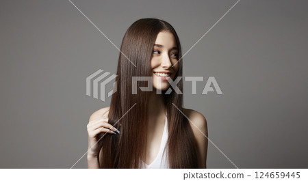 beautiful happy young woman. smiling girl with healthy hair 124659445