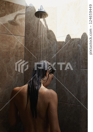 Naked wet girl in Shower. Beautiful sexy woman washable in outdoor shower Naked wet girl in Shower. Beautiful sexy woman washable in outdoor shower 124659449