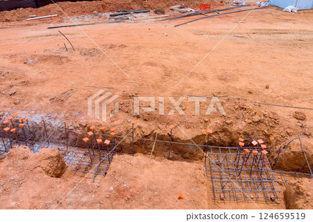 Prepare rebar foundations in construction site ready for next building stage. 124659519