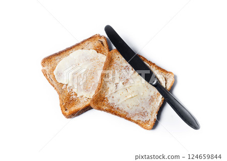 Sliced fresh bread and butter isolated on white background Sliced fresh bread and butter isolated on white background 124659844