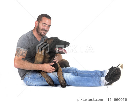 malinois and owner in studio 124660056