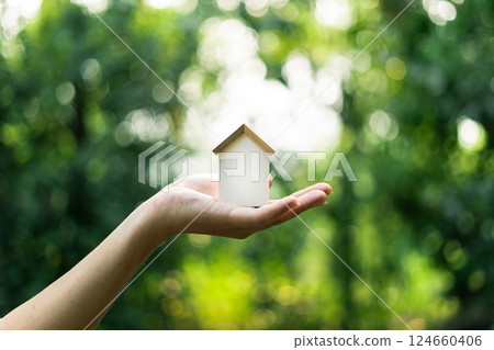 Eco-friendly house concept, The concept of real estate in mortgages. copyspace, copy space Eco-friendly house concept, The concept of real estate in mortgages. copyspace, copy space 124660406