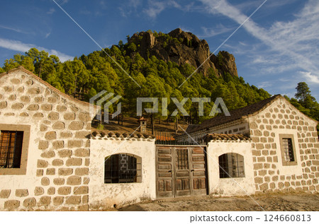 Pajonales forest house and cliff. Pajonales forest house and cliff. 124660813