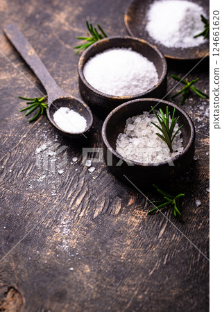 Natural sea salt crystals on dark background 124661620