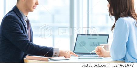 Two male and female businessmen making a meeting Two male and female businessmen making a meeting 124661678