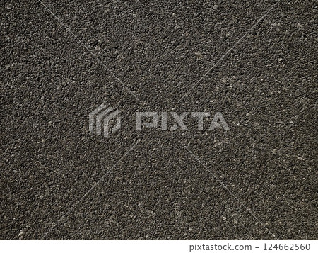 Close-Up Texture of Rough Asphalt Road Surface Close-Up Texture of Rough Asphalt Road Surface 124662560