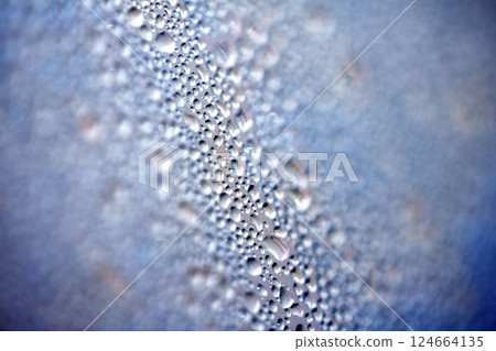 Water Condensation Small Bubbles Moisture on a Glass Window Close up Abstract Background 124664135