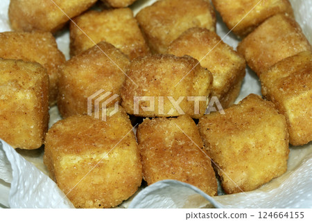 Close up of Square Cooked Crispy Fried Battered Tofu Soy Close up of Square Cooked Crispy Fried Battered Tofu Soy 124664155