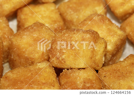 Close up of Square Cooked Crispy Fried Battered Tofu Soy Close up of Square Cooked Crispy Fried Battered Tofu Soy 124664156
