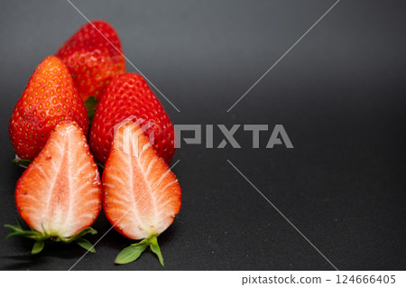 Crimson strawberries Crimson strawberries 124666405
