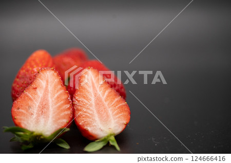 Crimson strawberries 124666416