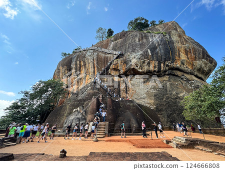 View of Sigiriya Rock from Lion Terrace, crowded with tourists, World Heritage Site 124666808
