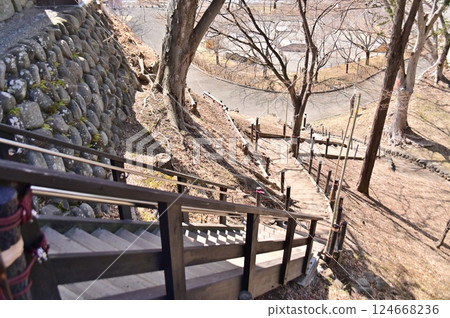 A steep staircase leading down from the West Tower of Ueda Castle to Ama-ga-fuchi A steep staircase leading down from the West Tower of Ueda Castle to Ama-ga-fuchi 124668236