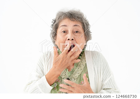 Senior woman portrait surprised Senior woman portrait surprised 124668730