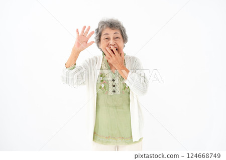 Senior woman portrait surprised Senior woman portrait surprised 124668749