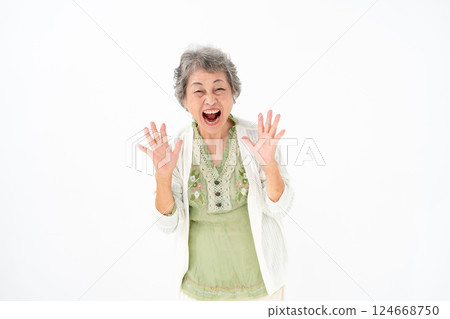 Senior woman portrait surprised Senior woman portrait surprised 124668750