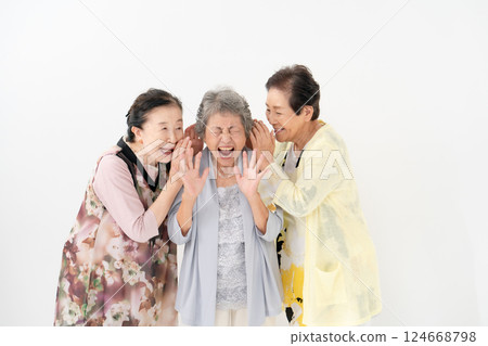 Senior woman secret conversation Senior woman secret conversation 124668798