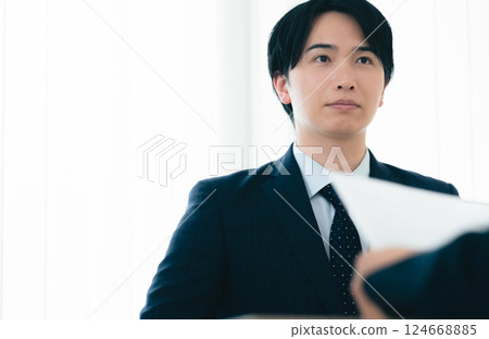 Businessman getting nervous during an interview 124668885