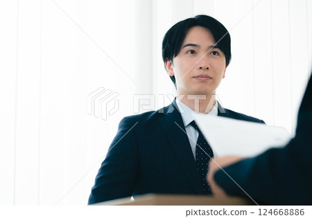 Businessman getting nervous during an interview 124668886