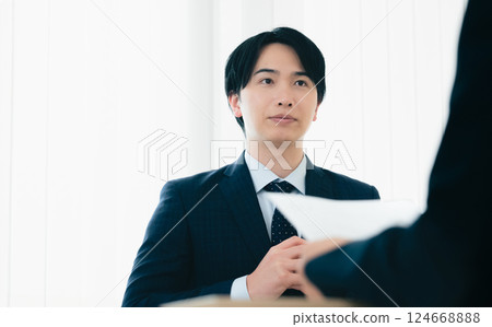 Businessman getting nervous during an interview 124668888