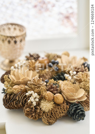 Christmas wreath decorated on a window sill Christmas image Christmas wreath decorated on a window sill Christmas image 124669184