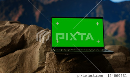 Pristine national park landscape with rocky ledges and copy space screen, forested peaks. This adventure destination is perfect for exploration, and reconnecting with nature in a majestic setting. 124669581