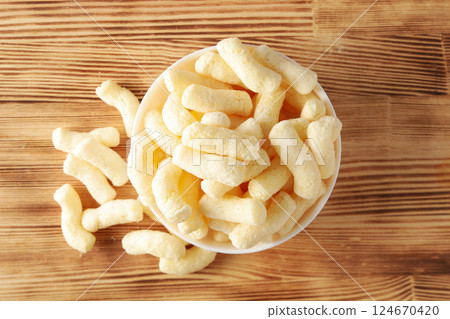 Corn sticks, concept of tasty snack food 124670420