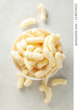 Corn sticks, concept of tasty snack food Corn sticks, concept of tasty snack food 124670425