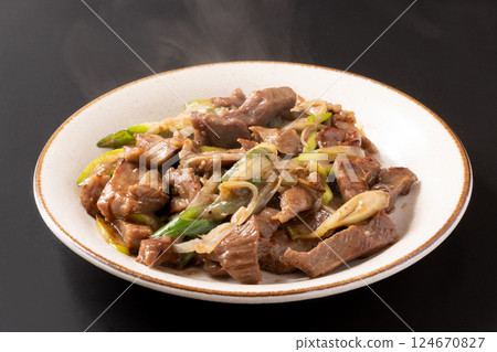 Beef tongue stir-fried with green onions and salt Beef tongue stir-fried with green onions and salt 124670827