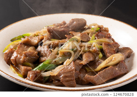 Beef tongue stir-fried with green onions and salt Beef tongue stir-fried with green onions and salt 124670828