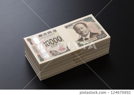 5 million yen on a black background 124670892