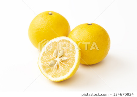 Golden tangerine on white background 124670924