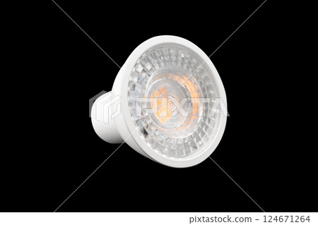LED light bulb isolated on black background. Energy super saving electric lamp 124671264